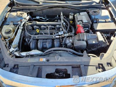 Zdjęcie 11 z 12 samochodu: 2012 FORD FUSION SE VIN:3FAHP0HA0CR390958 - miniatura