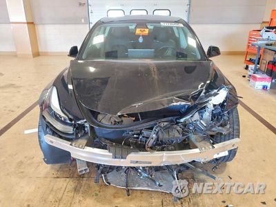 Piąte zdjęcie samochodu w środku: 2022 TESLA MODEL 3 VIN:5YJ3E1EB6NF129884 - miniatura