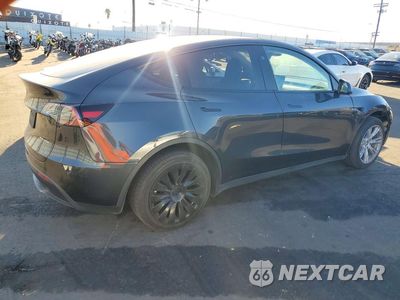 Trzecie zdjęcie samochodu z tyłu: 2024 TESLA MODEL Y VIN:7SAYGDEE7RF070865 - miniatura
