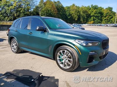 Czwarte zdjęcie samochodu z boku: 2020 BMW X5 M50I VIN:5UXJU4C02L9B09072 - miniatura