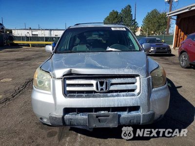 Piąte zdjęcie samochodu w środku: 2006 HONDA PILOT EX VIN:2HKYF18416H509752 - miniatura