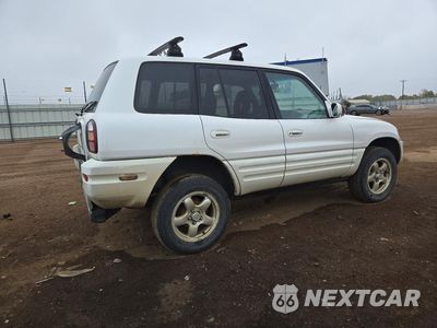 Trzecie zdjęcie samochodu z tyłu: 1999 TOYOTA RAV4 BASE VIN:JT3HP10V3X7142848 - miniatura