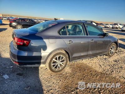 Trzecie zdjęcie samochodu z tyłu: 2017 VOLKSWAGEN JETTA SE VIN:3VWDB7AJ6HM231695 - miniatura