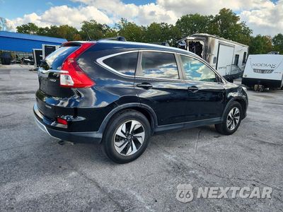 Trzecie zdjęcie samochodu z tyłu: 2016 HONDA CR-V TOURING VIN:5J6RM4H90GL000475 - miniatura