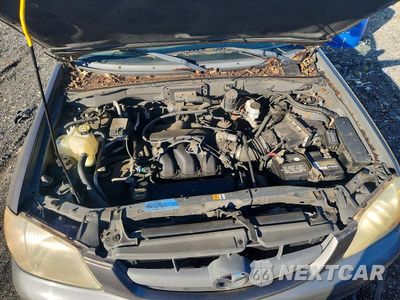 Zdjęcie 12 z 13 samochodu: 2002 MAZDA TRIBUTE VIN:4F2CU08192KM50946 - miniatura