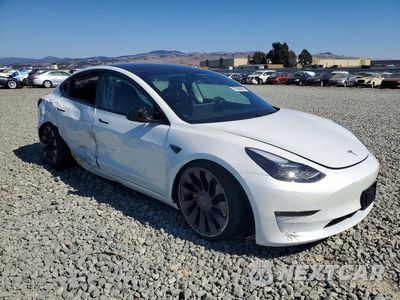 Czwarte zdjęcie samochodu z boku: 2023 TESLA MODEL 3 VIN:5YJ3E1EC9PF507210 - miniatura