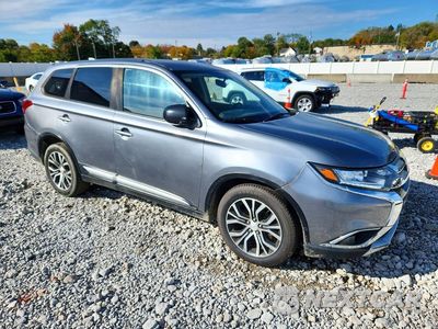 Czwarte zdjęcie samochodu z boku: 2017 MITSUBISHI OUTLANDER ES VIN:JA4AD2A33HZ057629 - miniatura