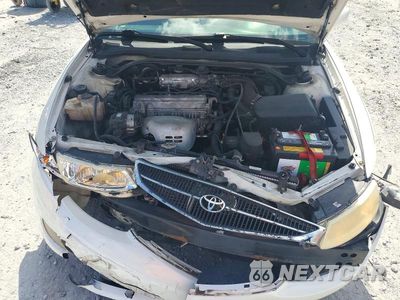Zdjęcie 11 z 12 samochodu: 2000 TOYOTA CAMRY SOLARA SE VIN:2T1CG22P6YC390800 - miniatura