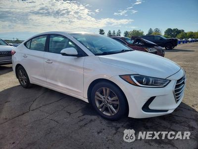 Czwarte zdjęcie samochodu z boku: 2017 HYUNDAI ELANTRA SE VIN:5NPD84LF7HH113640 - miniatura