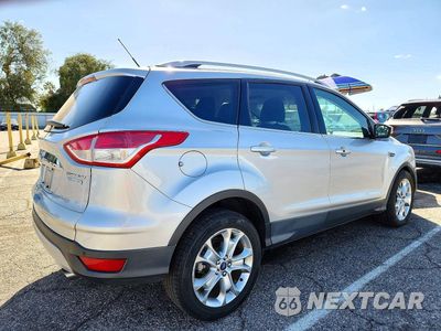 Trzecie zdjęcie samochodu z tyłu: 2015 FORD ESCAPE TITANIUM VIN:1FMCU0J9XFUA25631 - miniatura