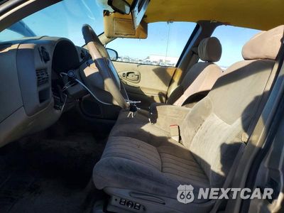 Zdjęcie 7 z 13 samochodu: 1999 CHEVROLET LUMINA BASE VIN:2G1WL52M4X9100710 - miniatura