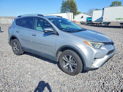 Czwarte zdjęcie samochodu z boku: 2016 TOYOTA RAV4 XLE VIN:2T3RFREV6GW454600 - miniatura