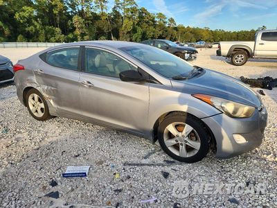 Czwarte zdjęcie samochodu z boku: 2013 HYUNDAI ELANTRA GLS VIN:KMHDH4AE8DU752731 - miniatura