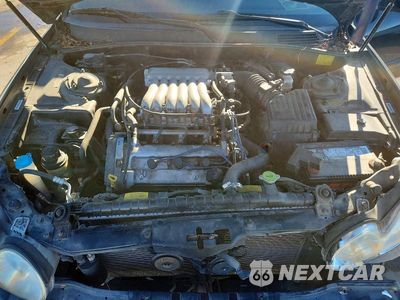 Zdjęcie 11 z 12 samochodu: 2002 HYUNDAI SONATA BASE VIN:KMHWF25HX2A666083 - miniatura