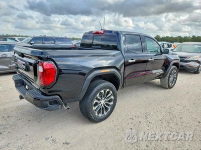 Trzecie zdjęcie samochodu z tyłu: 2025 GMC CANYON DENALI VIN:1GTP2FEK2S1200266 - miniatura