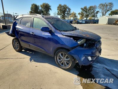 Czwarte zdjęcie samochodu z boku: 2014 HYUNDAI TUCSON SE VIN:KM8JUCAG8EU899658 - miniatura