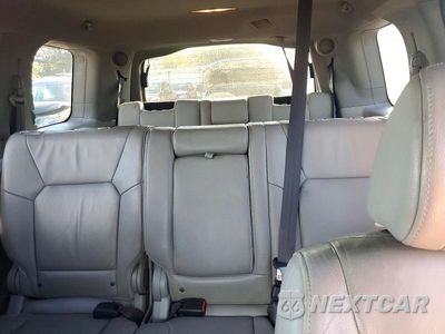Zdjęcie 10 z 13 samochodu: 2013 HONDA PILOT TOURING VIN:5FNYF4H90DB033034 - miniatura