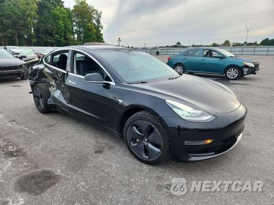 Czwarte zdjęcie samochodu z boku: 2019 TESLA MODEL 3 VIN:5YJ3E1EA3KF307124 - miniatura