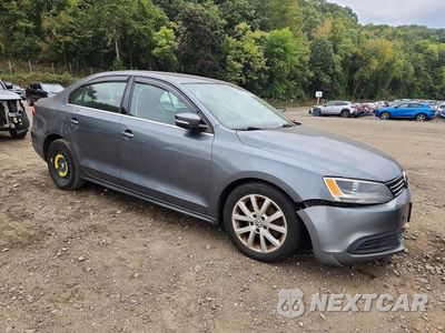 Czwarte zdjęcie samochodu z boku: 2013 VOLKSWAGEN JETTA SE VIN:3VWDP7AJ0DM429992 - miniatura