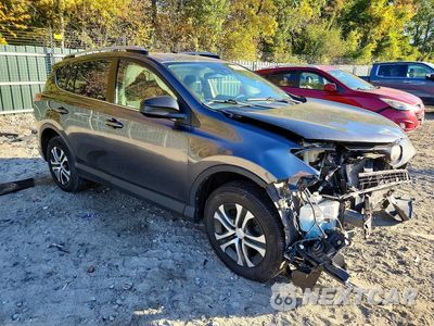 Czwarte zdjęcie samochodu z boku: 2017 TOYOTA RAV4 LE VIN:JTMBFREV2HJ114751 - miniatura