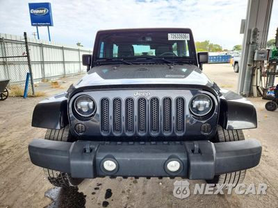Piąte zdjęcie samochodu w środku: 2015 JEEP WRANGLER UNLIMITED SAHARA VIN:1C4BJWEG4FL630318 - miniatura