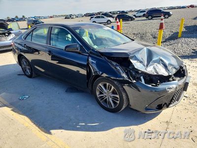Czwarte zdjęcie samochodu z boku: 2016 TOYOTA CAMRY HYBRID SE VIN:4T1BD1FK9GU197891 - miniatura