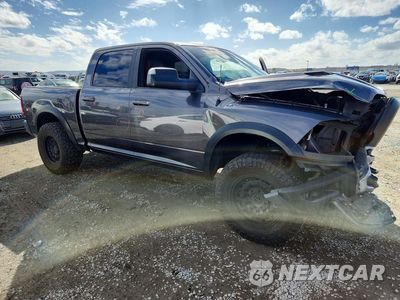 Czwarte zdjęcie samochodu z boku: 2017 RAM 1500 REBEL VIN:1C6RR7YT3HS655927 - miniatura
