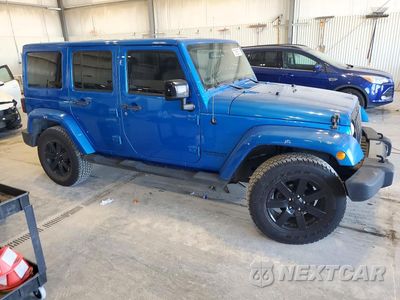 Czwarte zdjęcie samochodu z boku: 2014 JEEP WRANGLER UNLIMITED SAHARA VIN:1C4HJWEG9EL254093 - miniatura