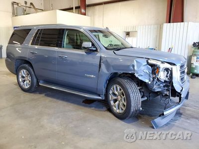 Czwarte zdjęcie samochodu z boku: 2015 GMC YUKON SLE VIN:1GKS1AKC8FR730122 - miniatura