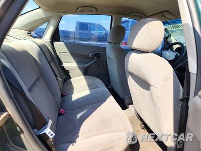Zdjęcie 10 z 12 samochodu: 2001 FORD FOCUS LX VIN:1FAFP33P81W296096 - miniatura