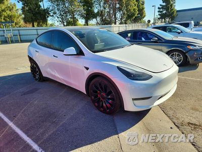 Czwarte zdjęcie samochodu z boku: 2022 TESLA MODEL Y VIN:7SAYGDEF5NF516448 - miniatura
