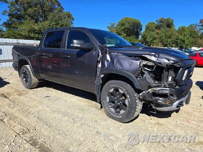 Czwarte zdjęcie samochodu z boku: 2019 RAM 1500 REBEL VIN:1C6SRFLT7KN722635 - miniatura