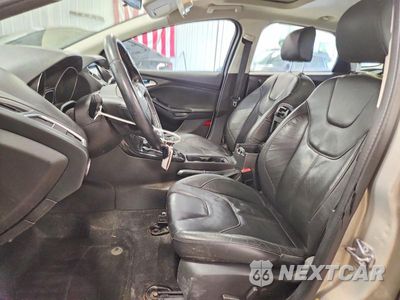 Zdjęcie 7 z 12 samochodu: 2016 FORD FOCUS TITANIUM VIN:1FADP3N20GL234226 - miniatura