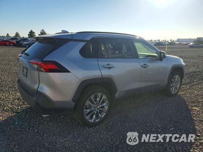 Trzecie zdjęcie samochodu z tyłu: 2019 TOYOTA RAV4 XLE PREMIUM VIN:JTMA1RFVXKD503703 - miniatura