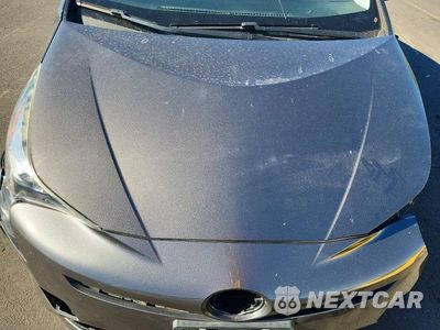 Zdjęcie 11 z 12 samochodu: 2016 TOYOTA PRIUS TWO VIN:JTDKBRFUXG3506865 - miniatura