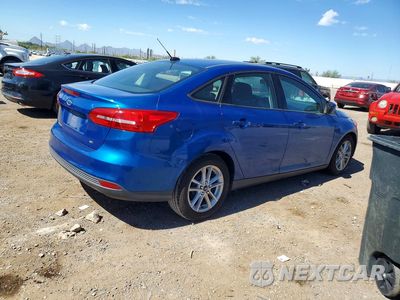 Trzecie zdjęcie samochodu z tyłu: 2018 FORD FOCUS SE VIN:1FADP3F27JL236321 - miniatura