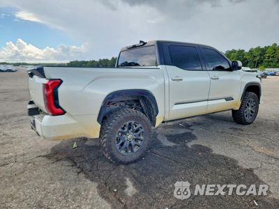 Trzecie zdjęcie samochodu z tyłu: 2023 TOYOTA TUNDRA PLATINUM VIN:5TFNA5DBXPX109076 - miniatura
