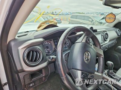 Zdjęcie 9 z 12 samochodu: 2017 TOYOTA TACOMA SR5 V6 VIN:3TMCZ5AN1HM054605 - miniatura