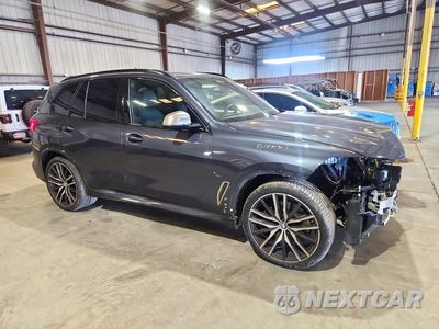 Czwarte zdjęcie samochodu z boku: 2020 BMW X5 M50I VIN:5UXJU4C03L9B00218 - miniatura