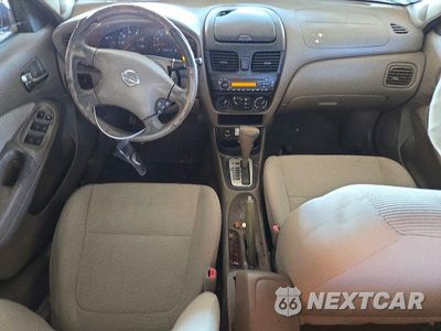 Zdjęcie 8 z 12 samochodu: 2004 NISSAN SENTRA 1.8/1.8S VIN:3N1CB51D94L482789 - miniatura