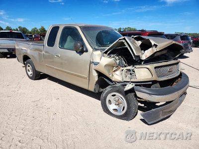 Czwarte zdjęcie samochodu z boku: 2000 FORD F150 VIN:1FTRX17WXYKA58099 - miniatura