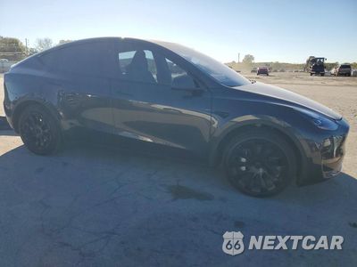 Czwarte zdjęcie samochodu z boku: 2024 TESLA MODEL Y VIN:7SAYGDED4RF091194 - miniatura