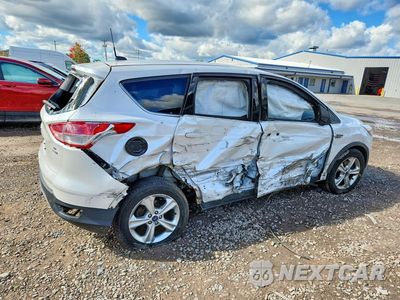 Trzecie zdjęcie samochodu z tyłu: 2014 FORD ESCAPE SE VIN:1FMCU9G96EUD64221 - miniatura