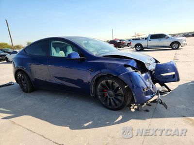 Czwarte zdjęcie samochodu z boku: 2022 TESLA MODEL Y VIN:7SAYGDEF5NF563415 - miniatura