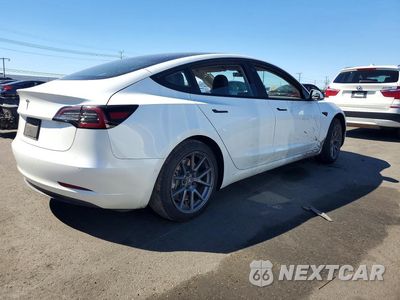 Trzecie zdjęcie samochodu z tyłu: 2022 TESLA MODEL 3 VIN:5YJ3E1EA3NF163515 - miniatura