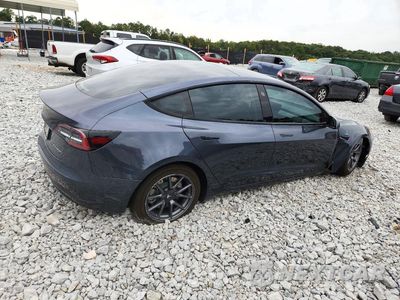 Trzecie zdjęcie samochodu z tyłu: 2022 TESLA MODEL 3 VIN:5YJ3E1EB4NF119161 - miniatura