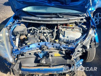 Zdjęcie 12 z 13 samochodu: 2014 TOYOTA PRIUS C TWO VIN:JTDKDTB31E1073840 - miniatura