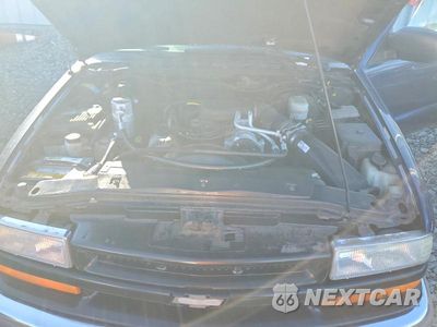 Zdjęcie 11 z 12 samochodu: 2000 CHEVROLET BLAZER VIN:1GNCT18WXYK192926 - miniatura