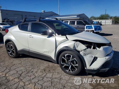 Czwarte zdjęcie samochodu z boku: 2019 TOYOTA C-HR XLE VIN:JTNKHMBX1K1052037 - miniatura