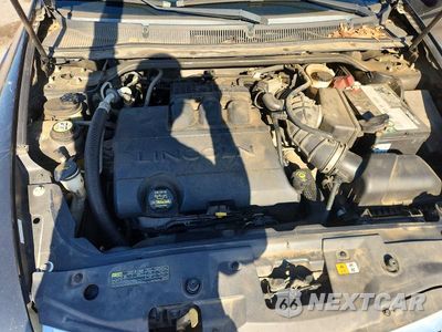 Zdjęcie 11 z 12 samochodu: 2009 LINCOLN MKS VIN:1LNHM93R79G605784 - miniatura